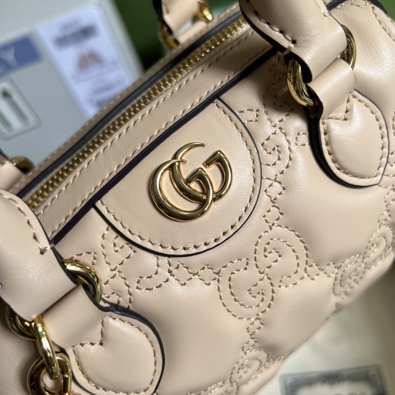 Gucci GG matelassé leather top handle bag beige ‎702251