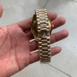 Replica Rolex 18K Gold Diamond Watch Red Face