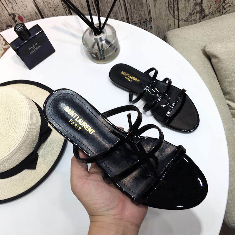 YSL Cassandra Flat Sandals in Patent Leather Black